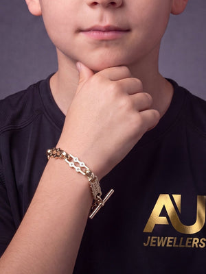 Kids 9ct Gold Filled Stars & Bars Bracelet With T-Bar worn on model, close-up