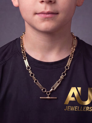 Kids 9ct Gold Filled Stars & Bars Chain With T-Bar worn on model, close-up