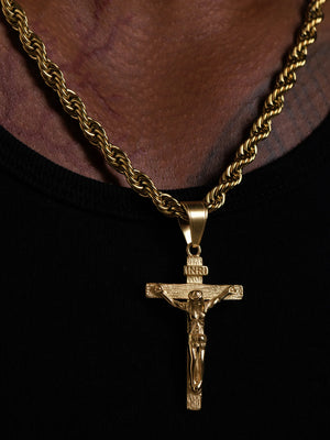 Close view of the INRI crucifix pendant showing the detailed figure and bail