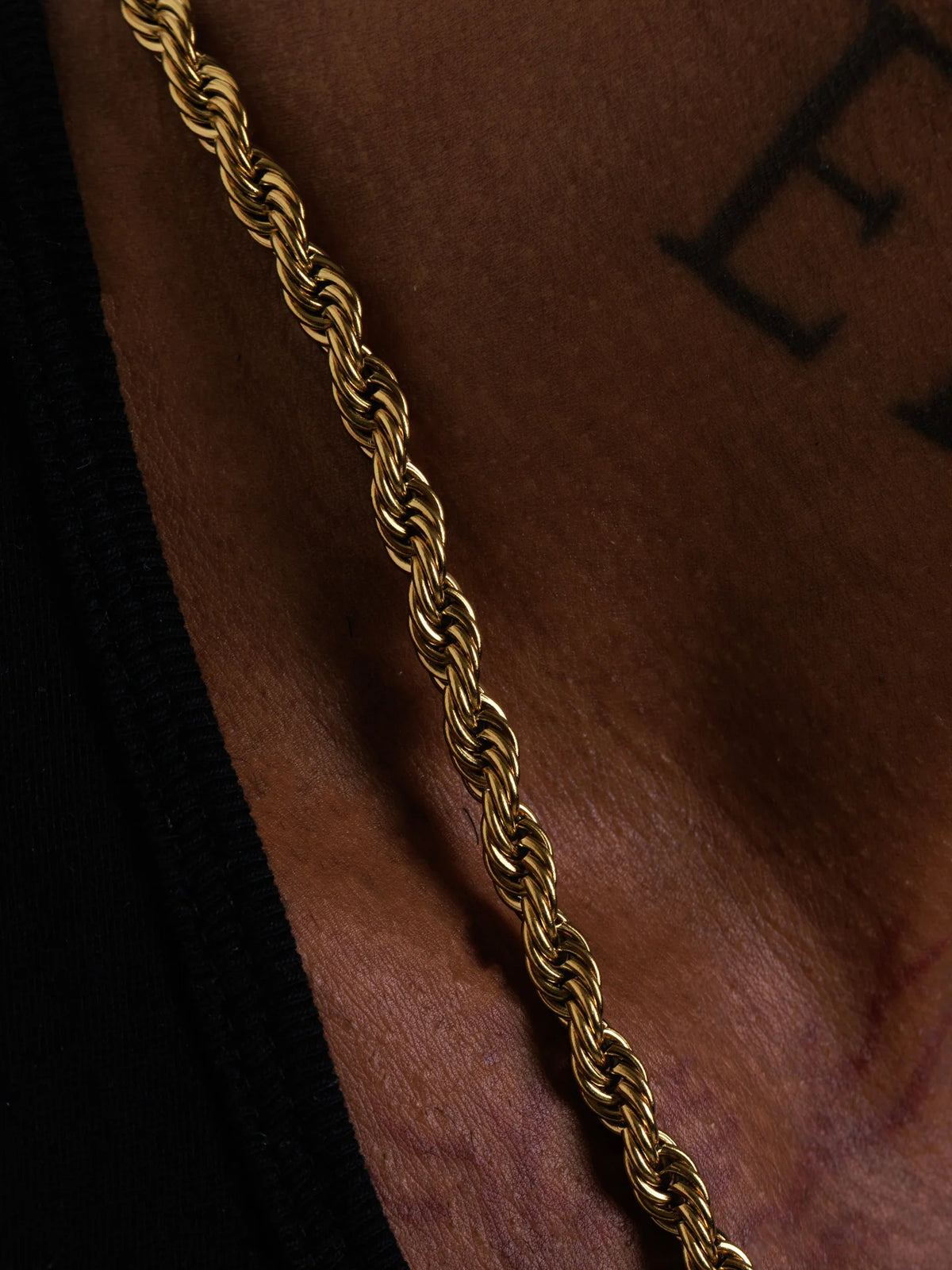 Macro detail of the braided 6mm gold filled rope chain links