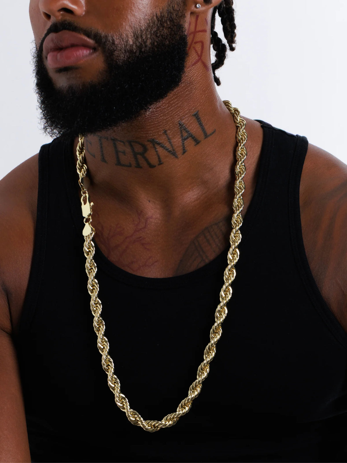 Close view of the 10mm gold filled rope chain sitting on the neck