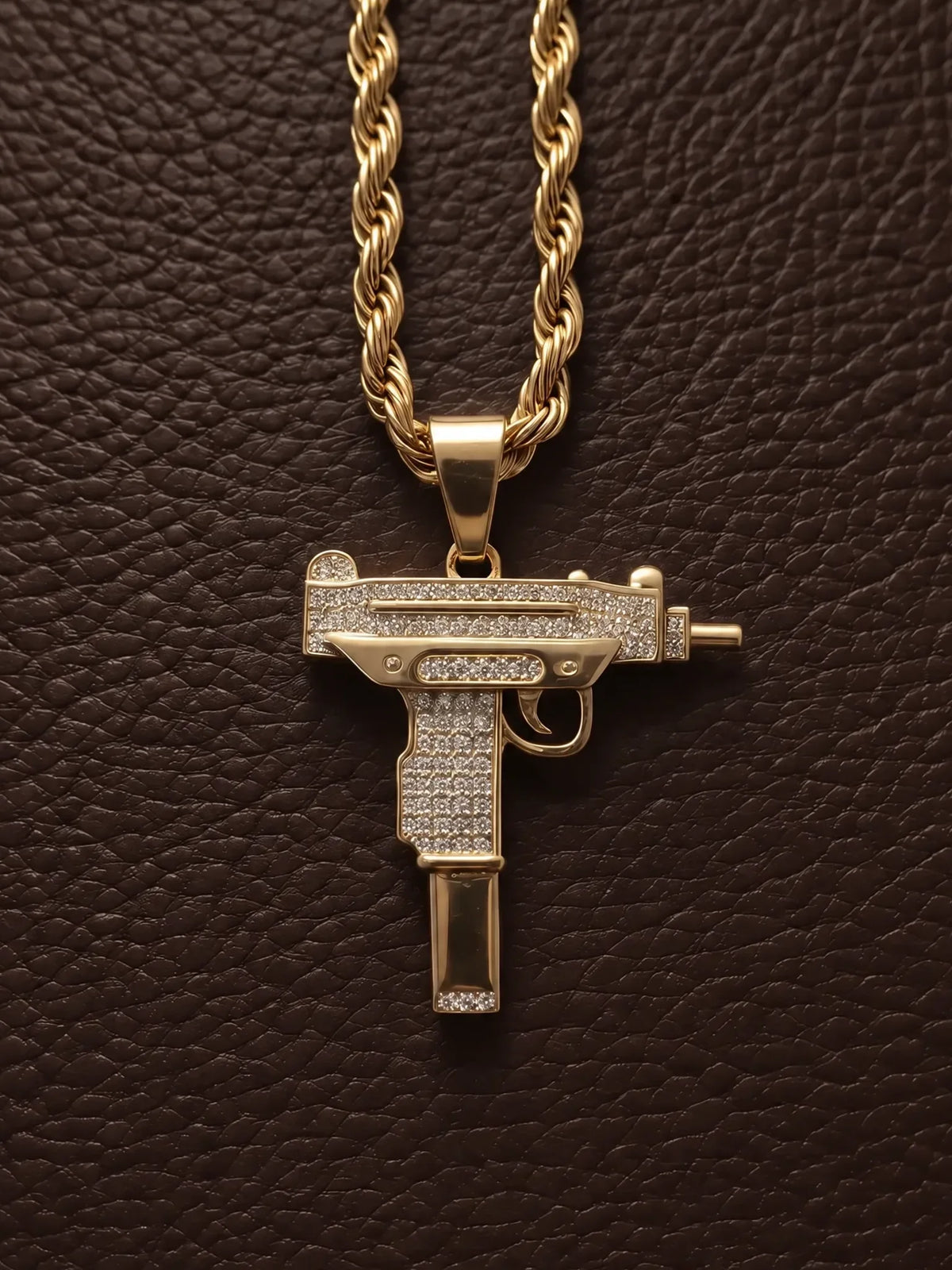 The uzi pendant shown full on with the 6mm rope chain above it