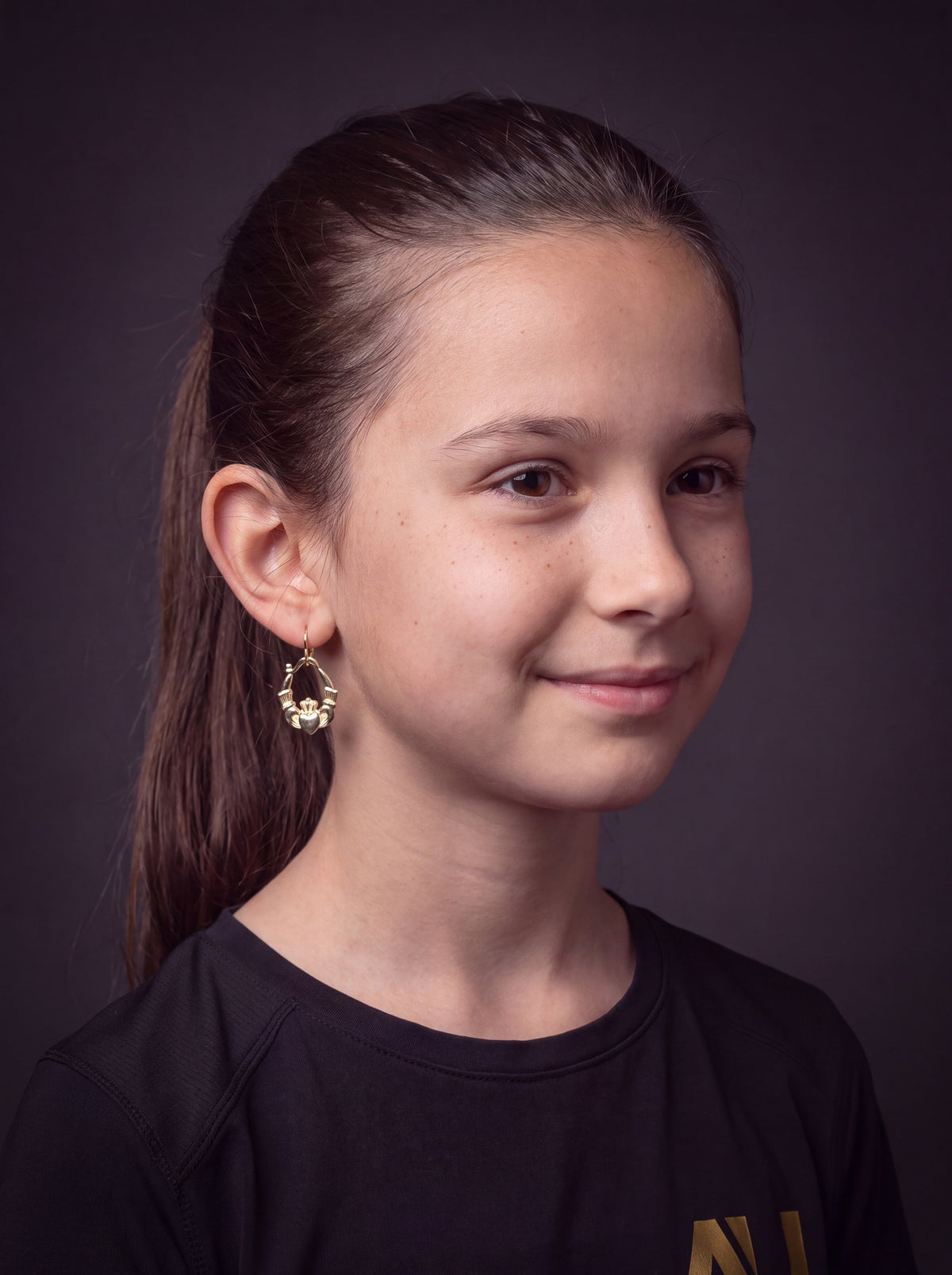 Kids 9ct Gold Filled Claddagh Earrings worn on model