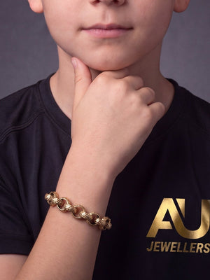 Kids 9ct Gold Filled Full Patterned Belcher Bracelet 12mm worn on model, close-up