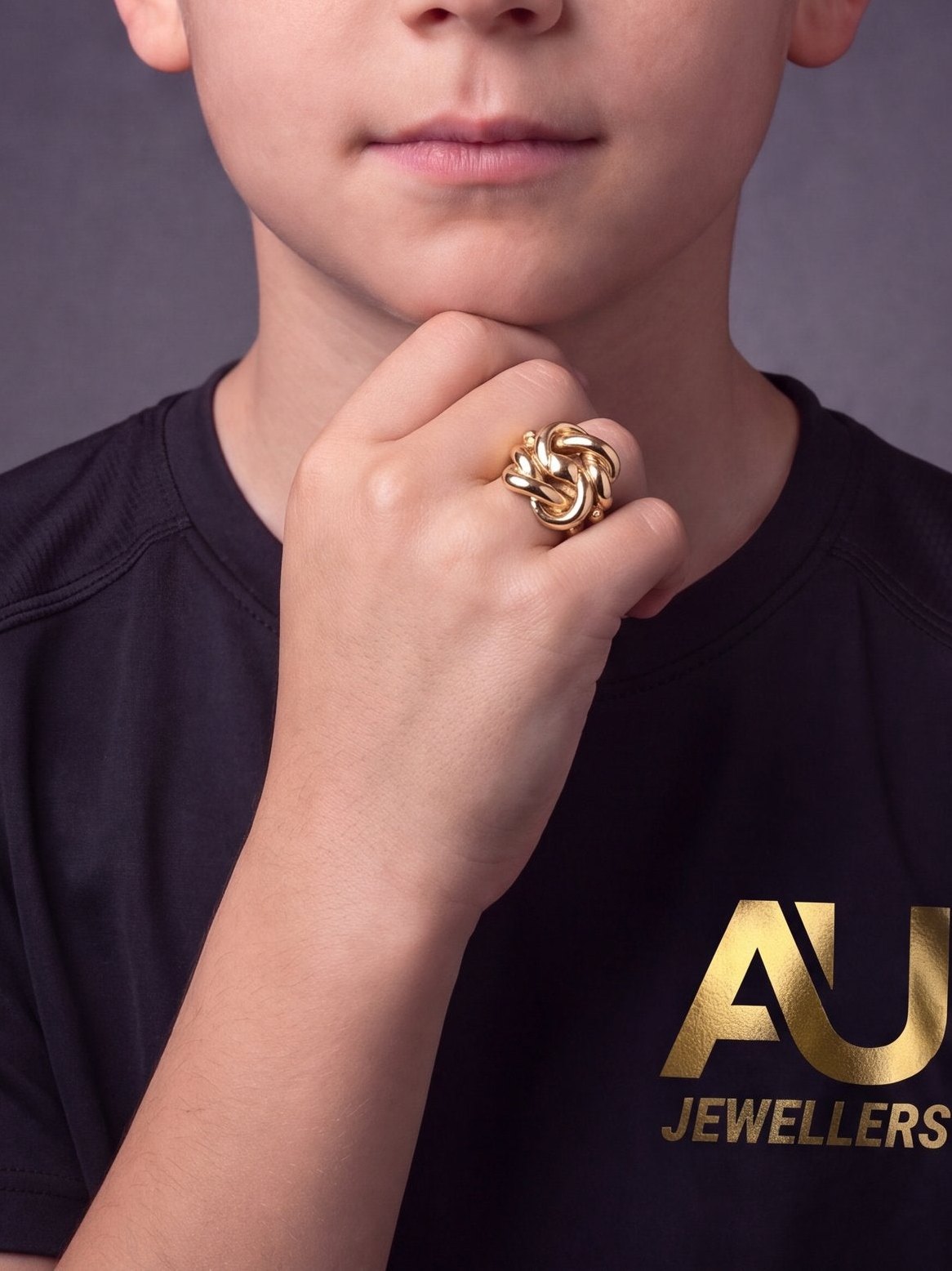 Kids 9ct Gold Filled Knot Ring worn on model, close-up