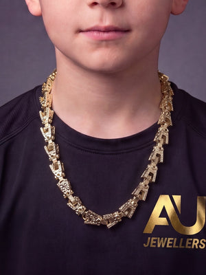 Kids 9ct Gold Filled Lego Chain 10mm worn on model, close-up