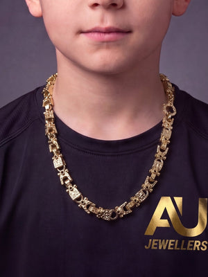 Kids 9ct Gold Filled Lego Chain 13mm worn on model, close-up