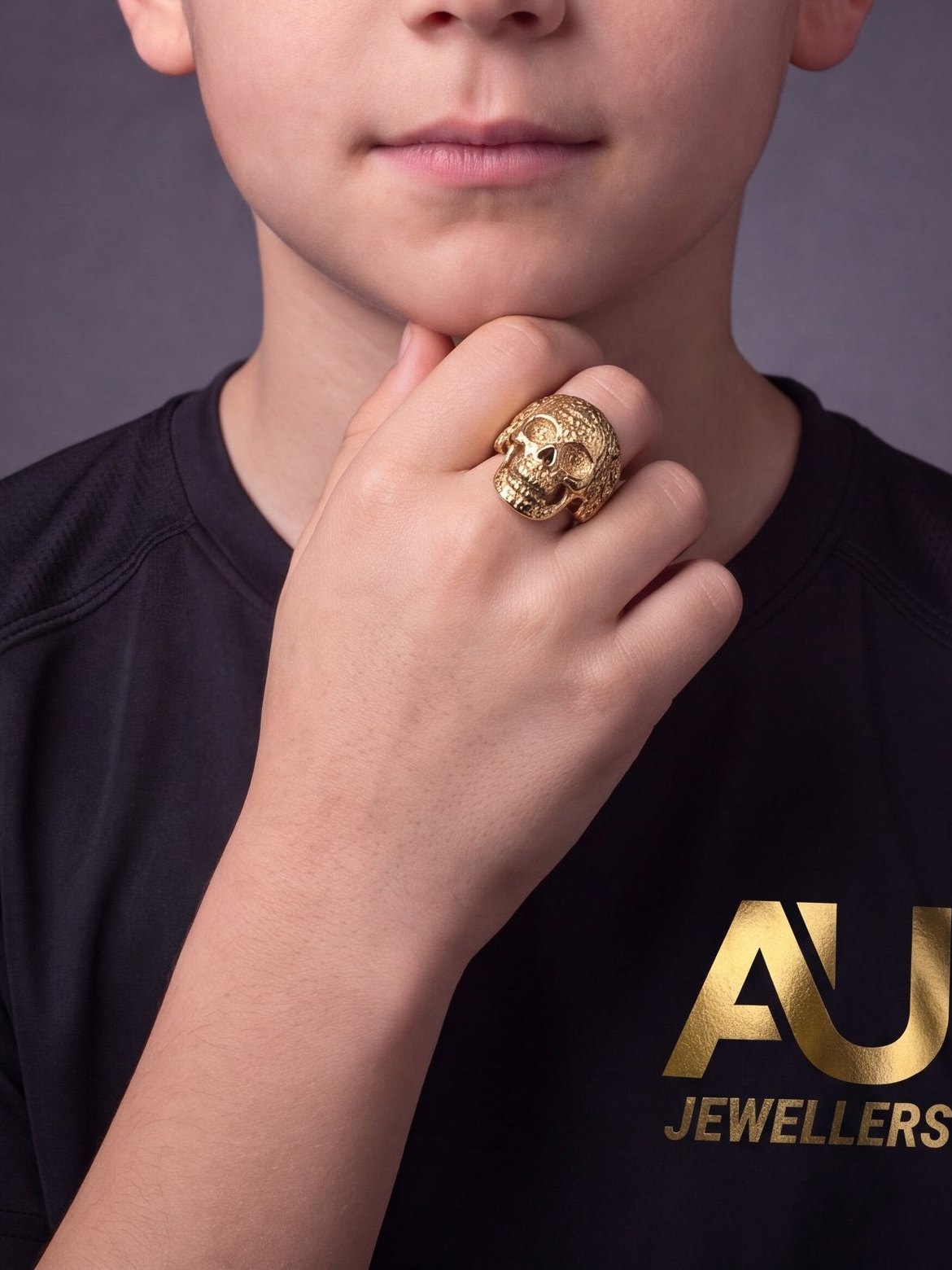Kids 9ct Gold Filled Skull Ring worn on model, close-up