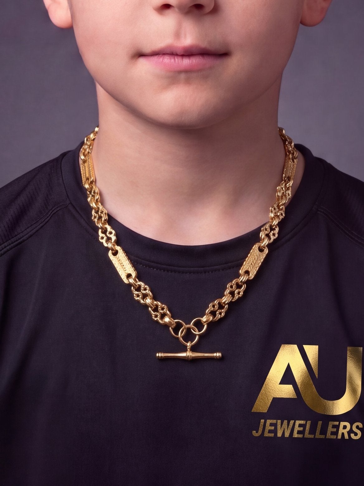 Kids 9ct Gold Filled Stars & Bars Chain 12mm worn on model, close-up