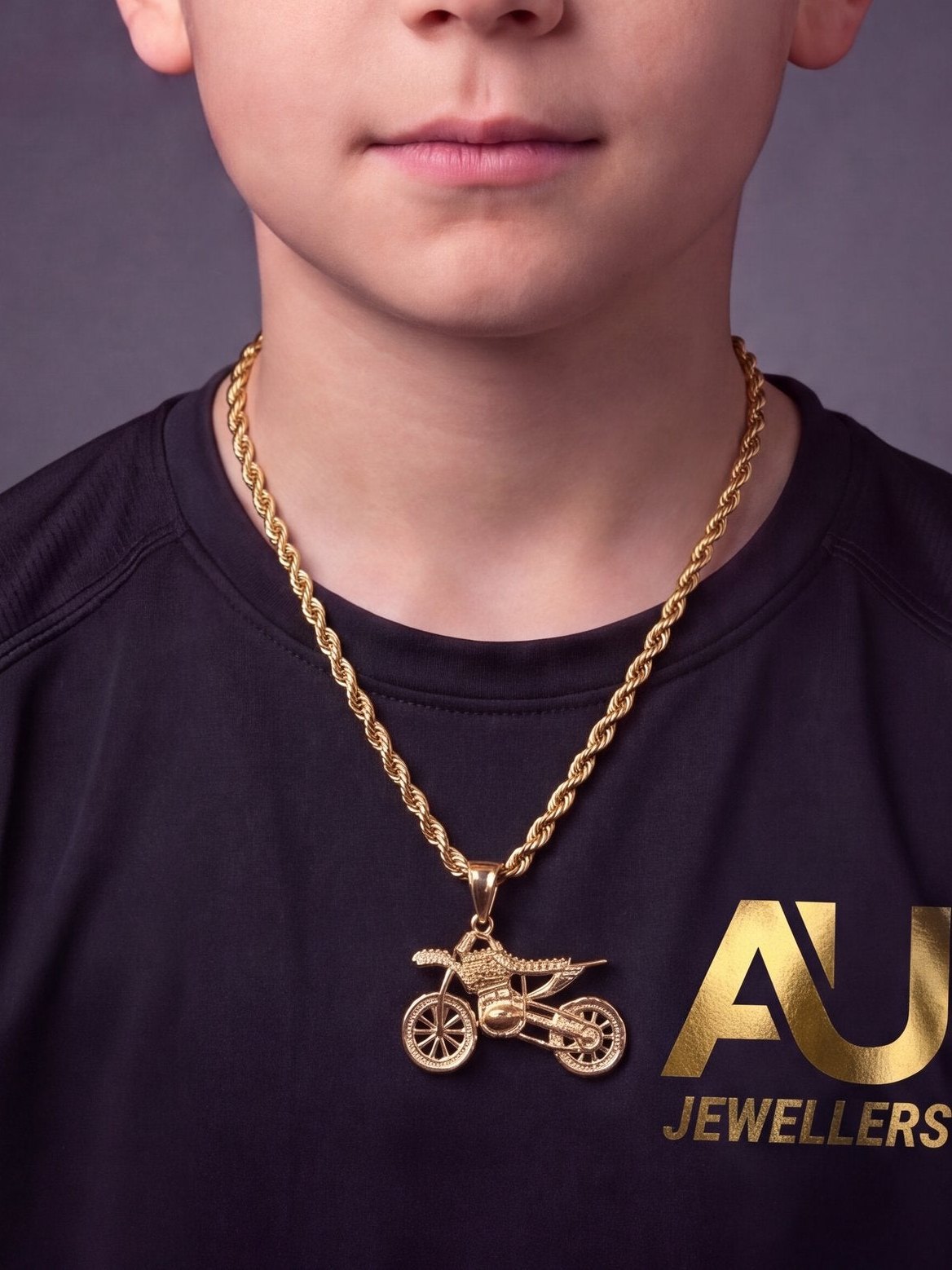 Kids Gold Filled Bike Pendant On A 6mm Rope Chain worn on model, close-up