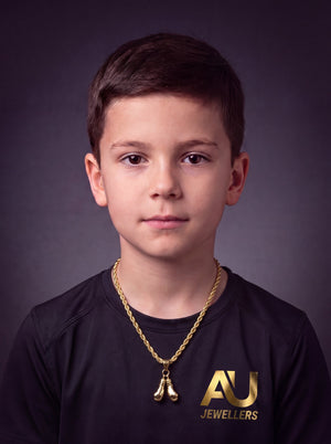 Kids Gold Filled Boxing Gloves Pendant On A 6mm Rope Chain worn on model