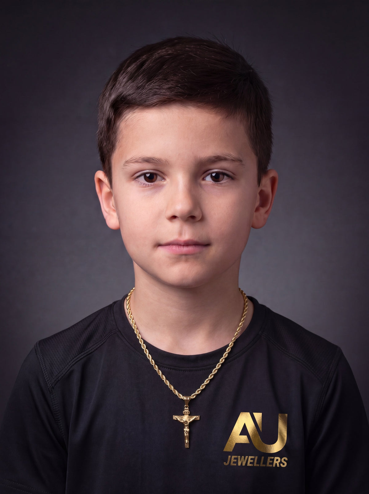 Kids Gold Filled Crucifix Pendant on a 6mm Rope Chain worn on model
