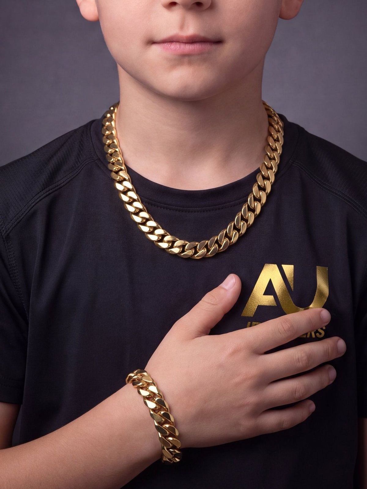 Kids Gold Filled Cuban Set 14mm worn on model, close-up