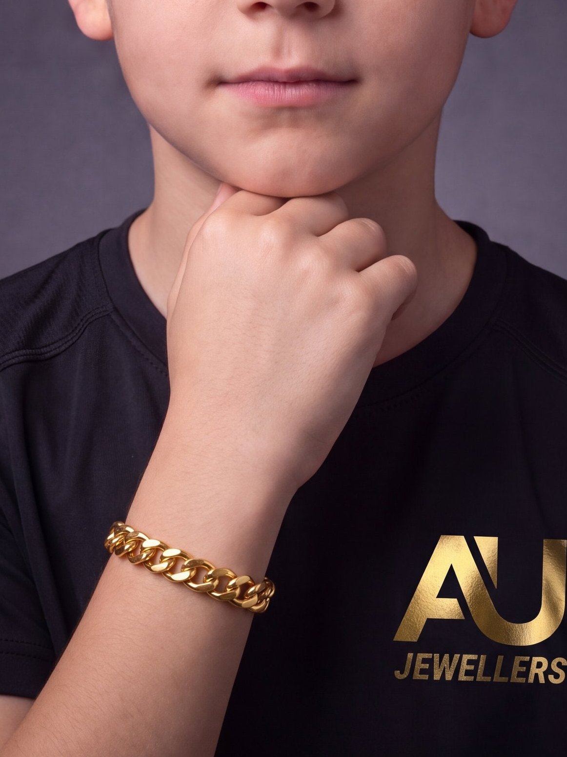 Kids Gold Filled Curb Bracelet 8mm worn on model, close-up