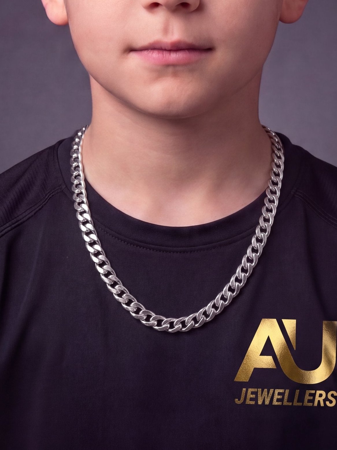Kids Silver Curb Chain 8mm worn on model, close-up